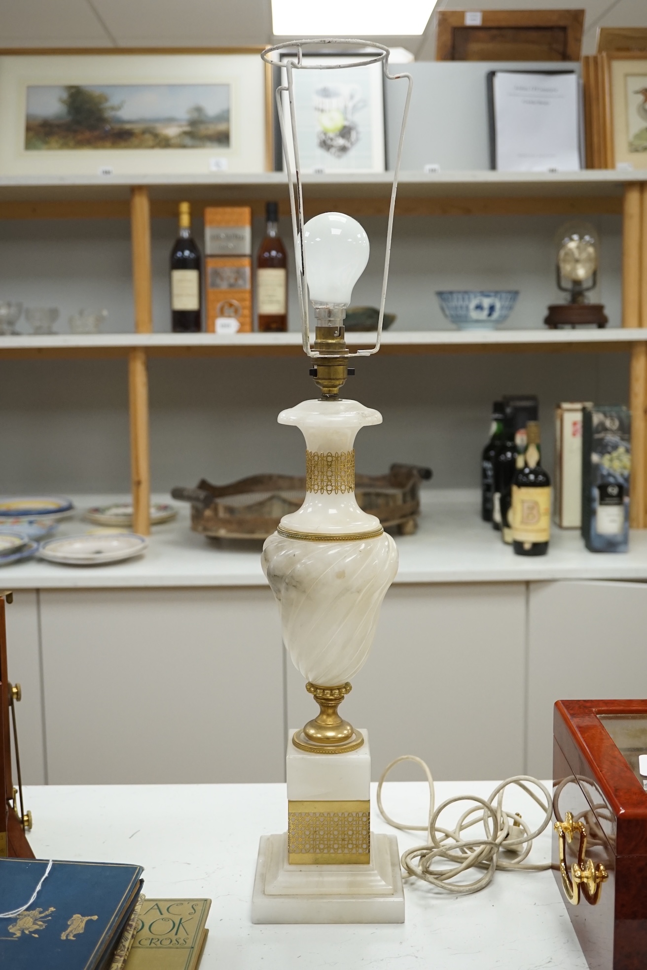 An alabaster and gilt table lamp, 44cm to top of alabaster. Condition - fair